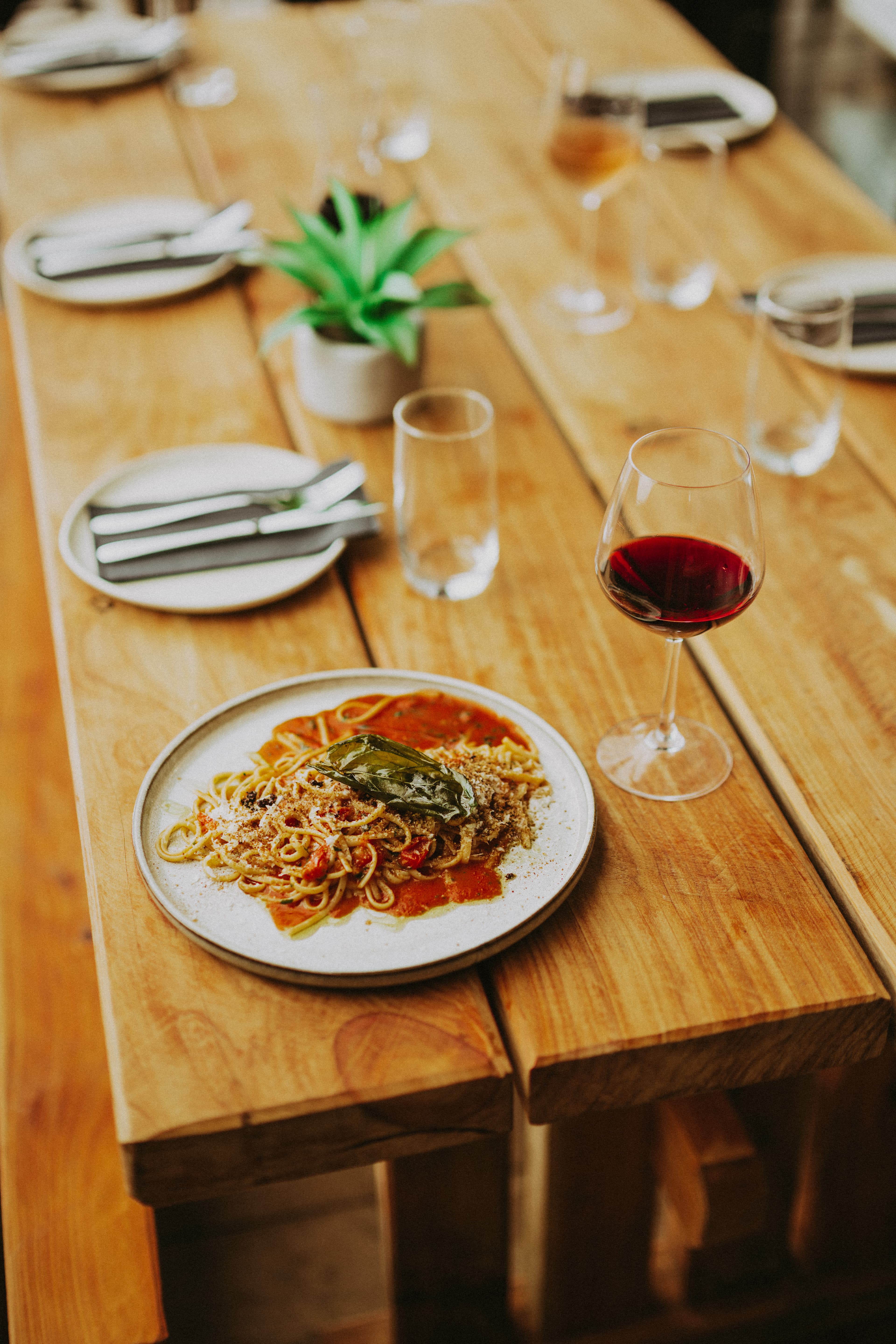 Handmade pasta with sage and red wine